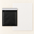 EverSealed black-padded-envelope with full unfolded cotton writing paper