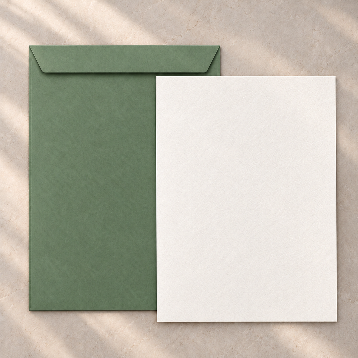C4 green envelope with full unfolded cotton writing paper