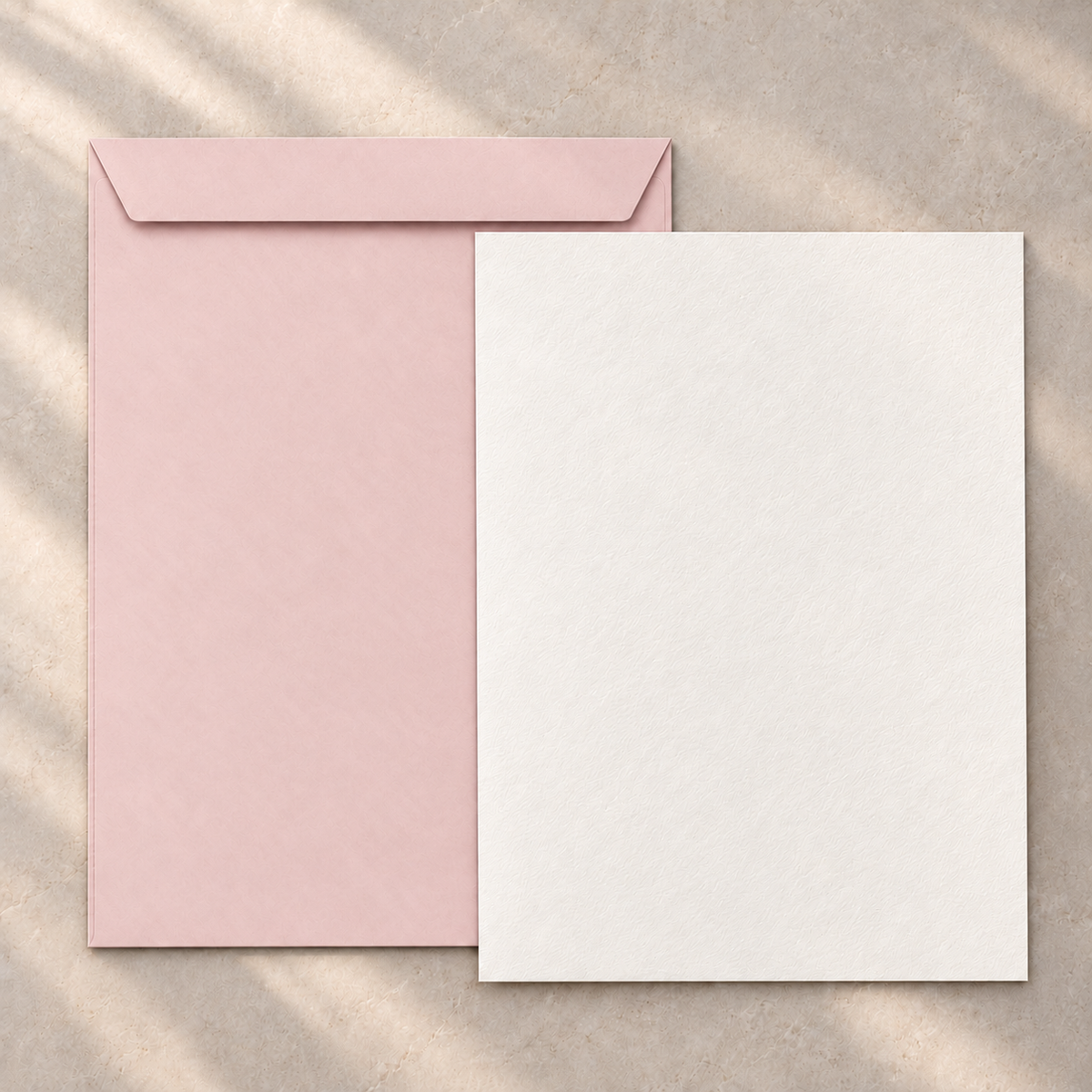 C4 pink envelope with full unfolded cotton writing paper
