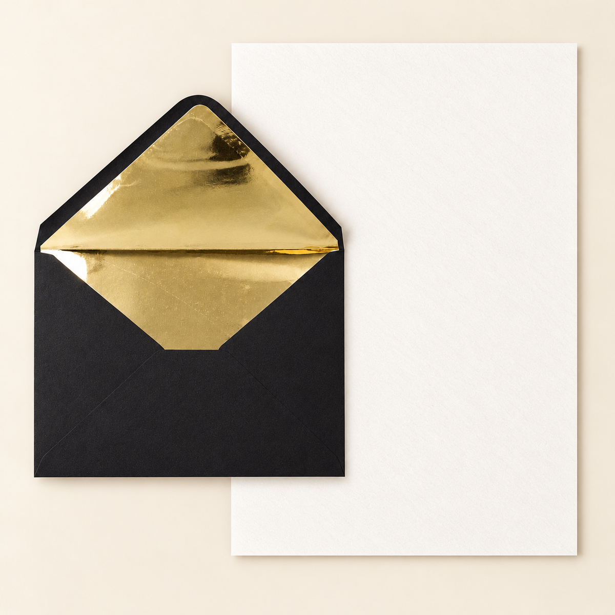 Black C5 gold-lined envelope with one full unfolded cotton writing sheet