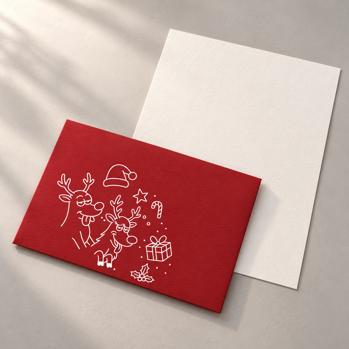 Dark Red Funny Christmas C6 envelope with one sheet of Original Crown Mill Pure Cotton writing paper.